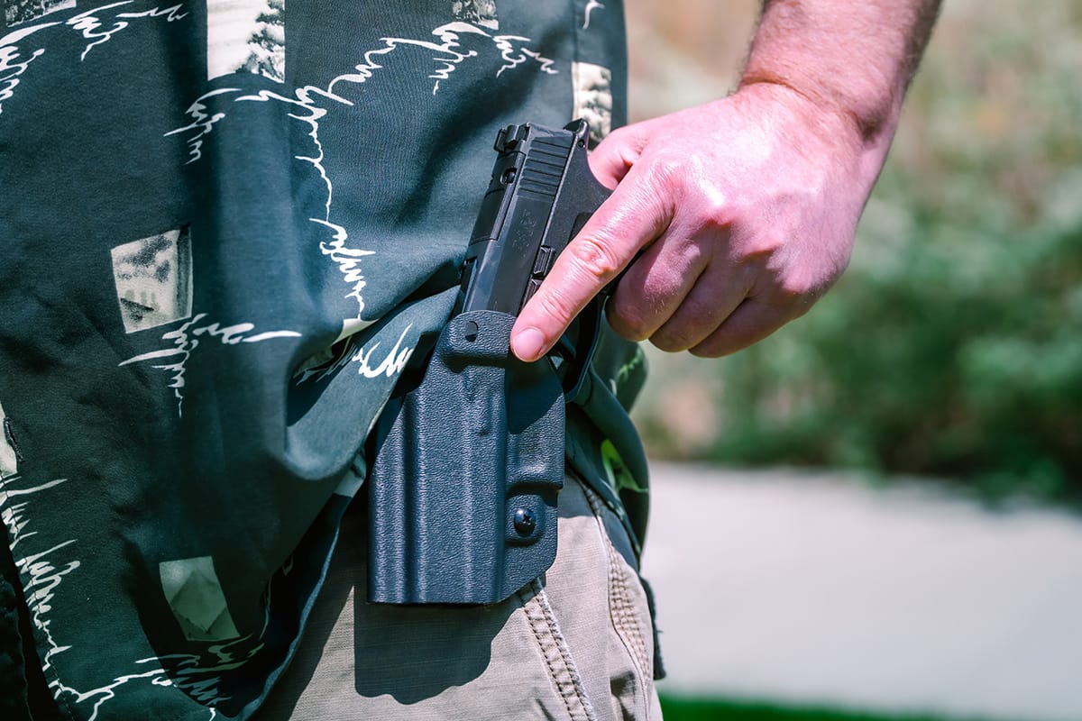 Man with sig sauer p365x concealed carry handgun