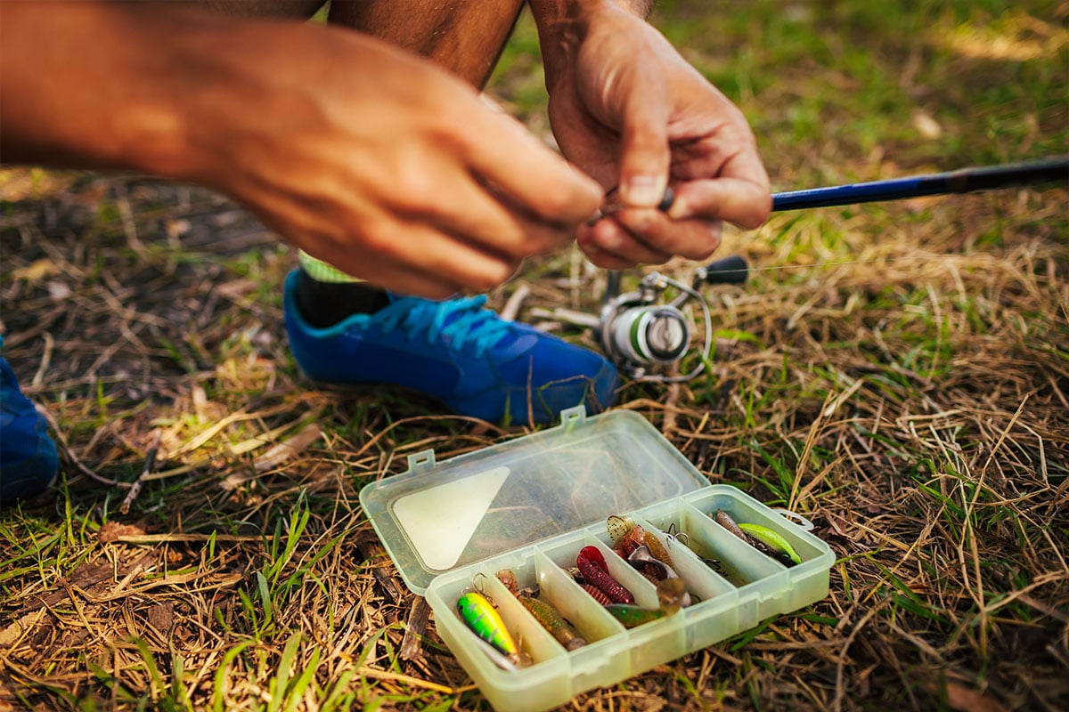 Man baiting a fishing hook