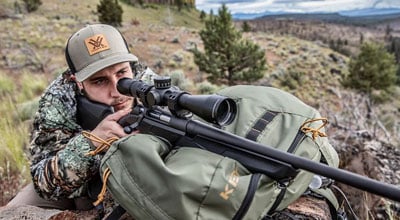 Man aiming Vortex rifle scope