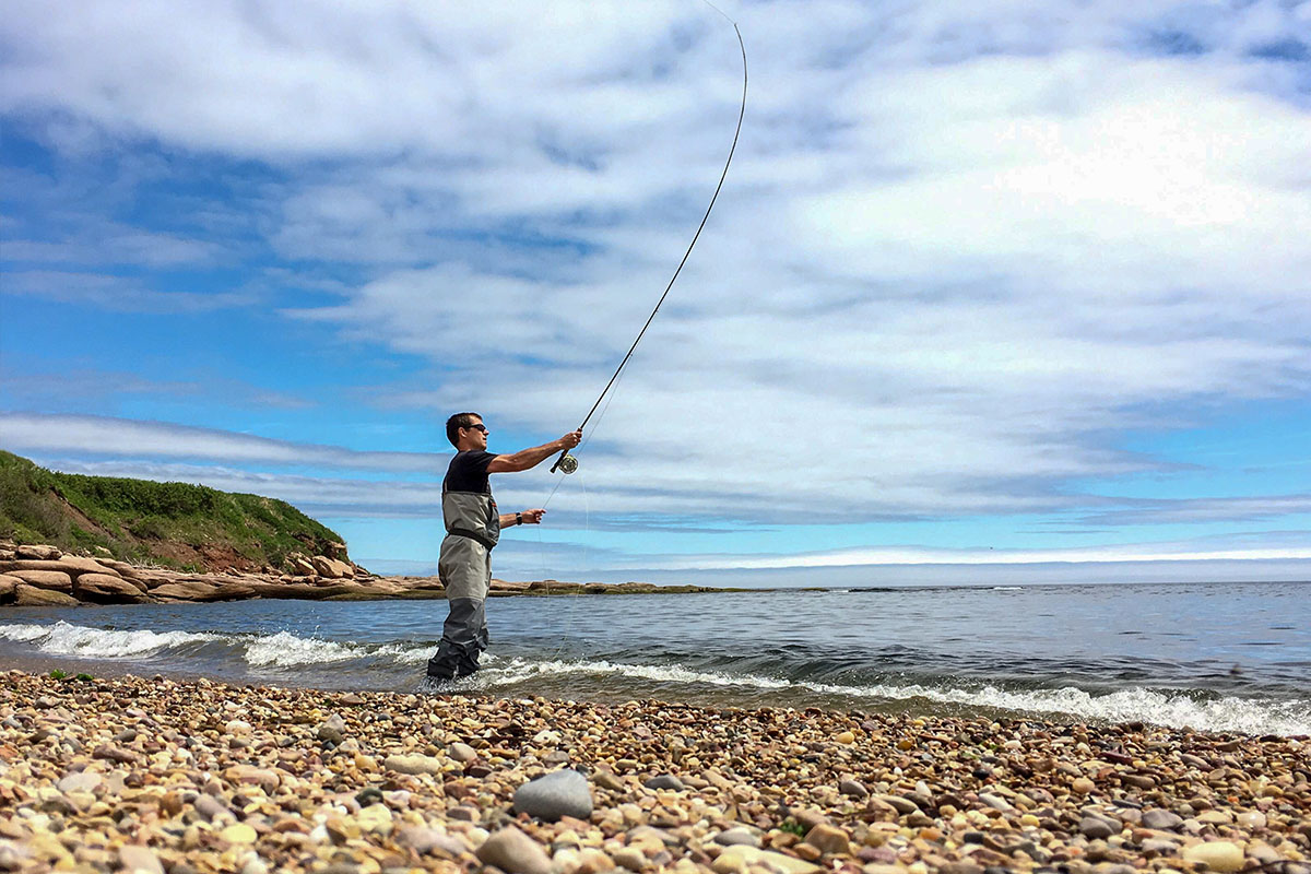 Man fly fishing for smallmouth bass