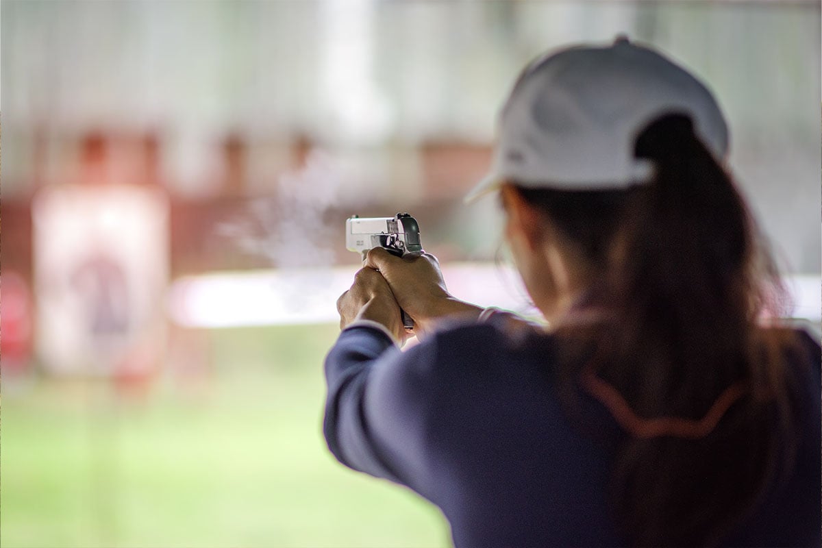 woman shooting a pistol