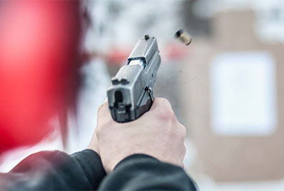 handgun recoiling