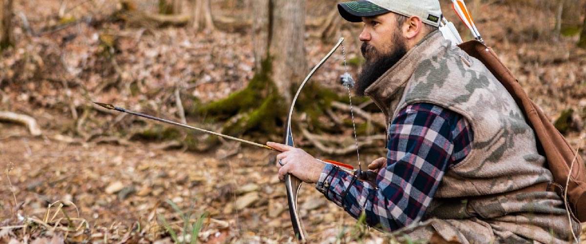 Man Holding Arrow