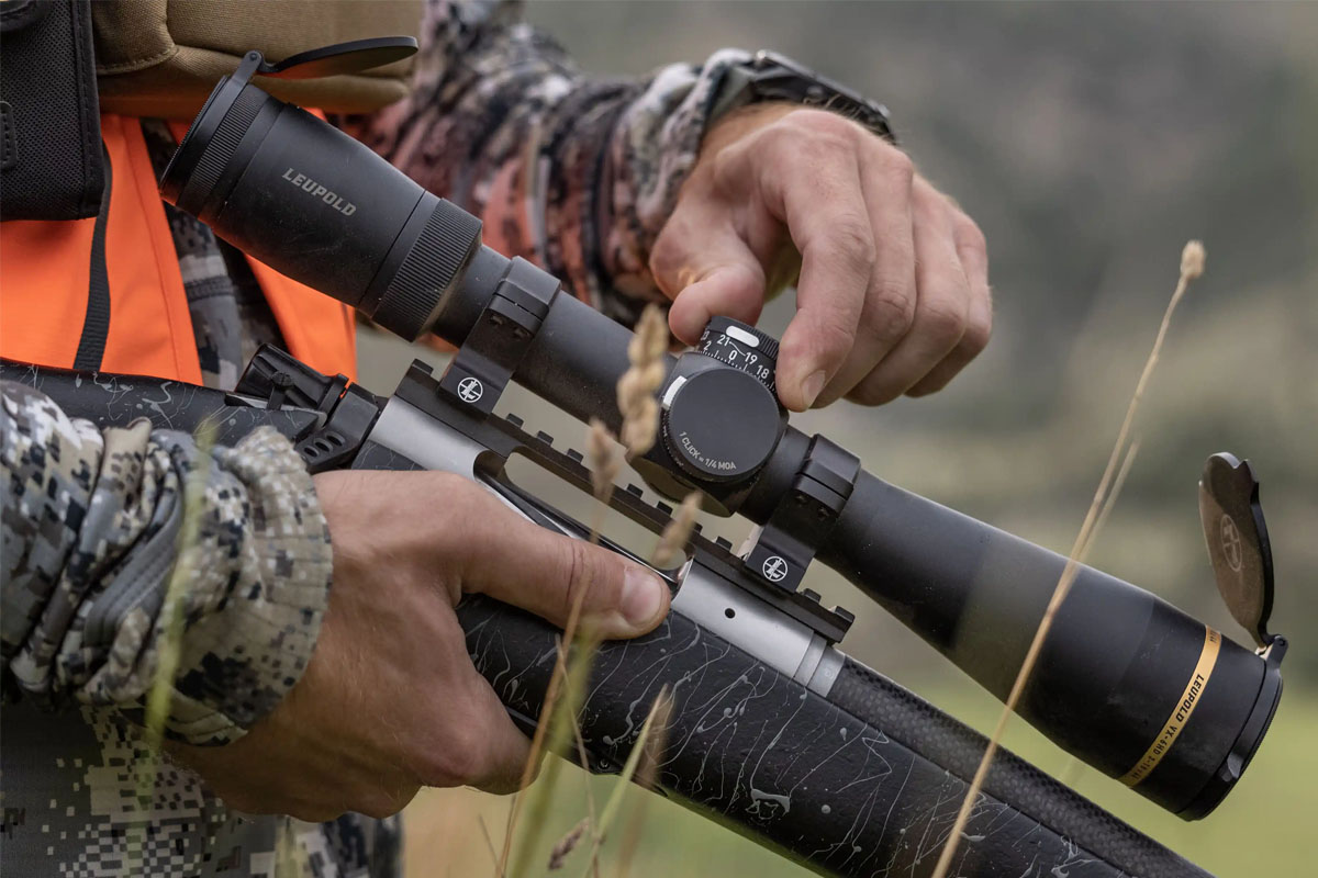Man adjusting a luepold rifle scope