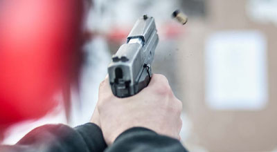 Person shooting a handgun