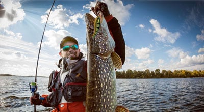 Man catches pike with crankbait
