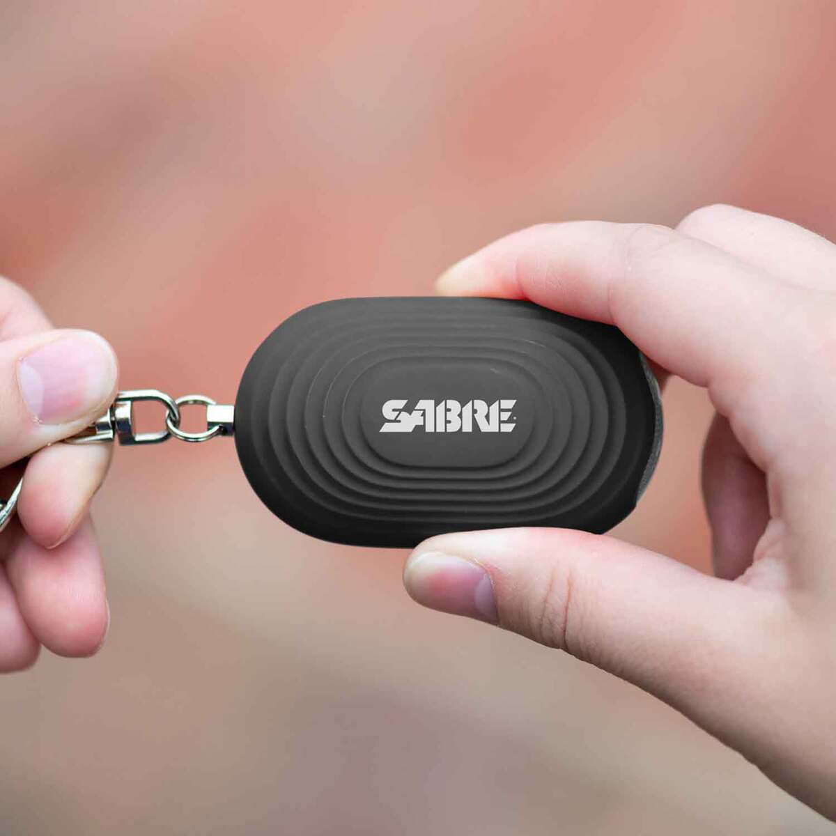 SABRE 2-in-1 Personal Alarm with LED Light and Snap Hook - Black SABRE 2-in-1 Personal Alarm with LED Light and Snap Hook - Black