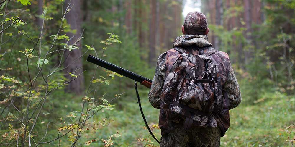 hunter with shotgun