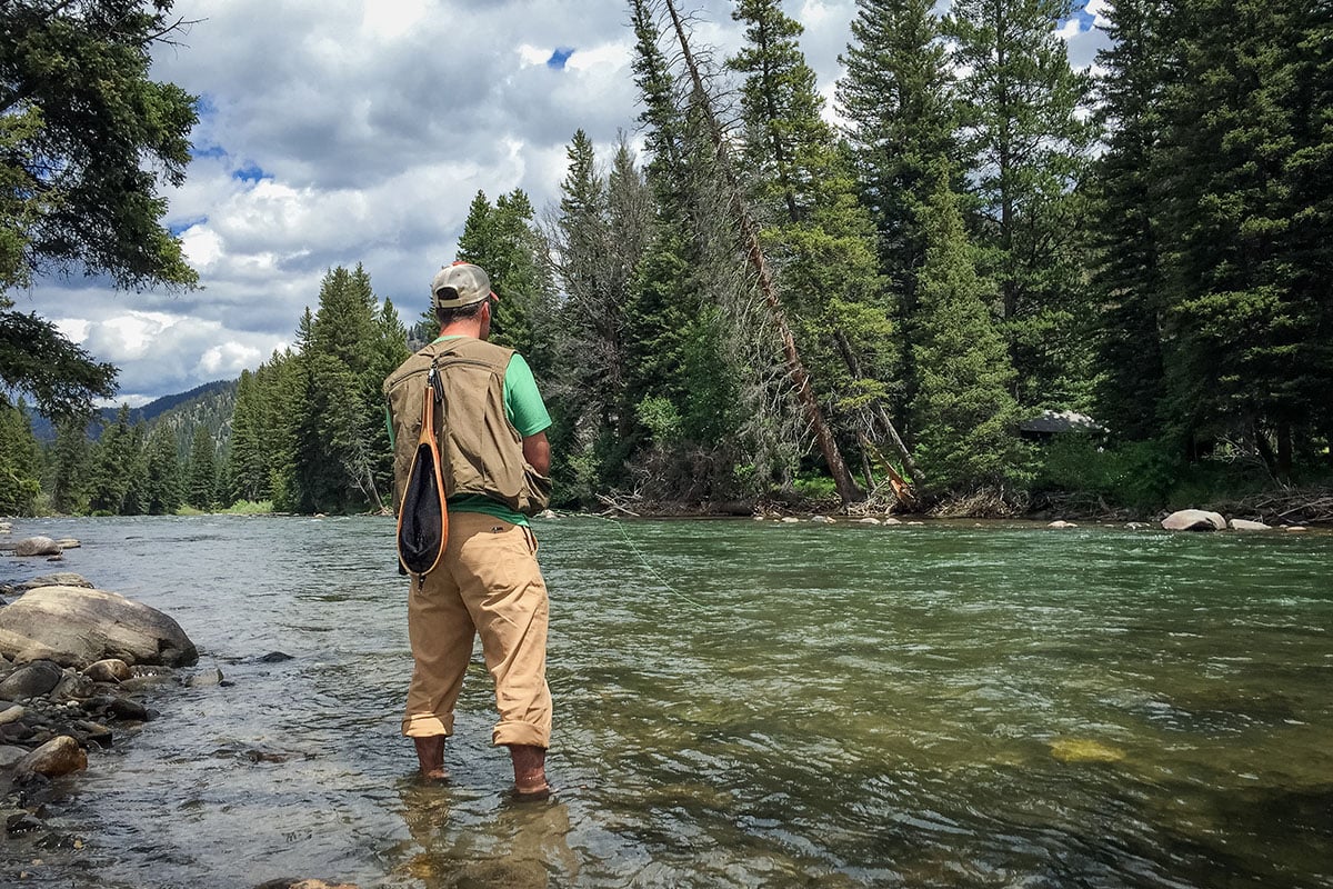 Man fly fishing on a lake